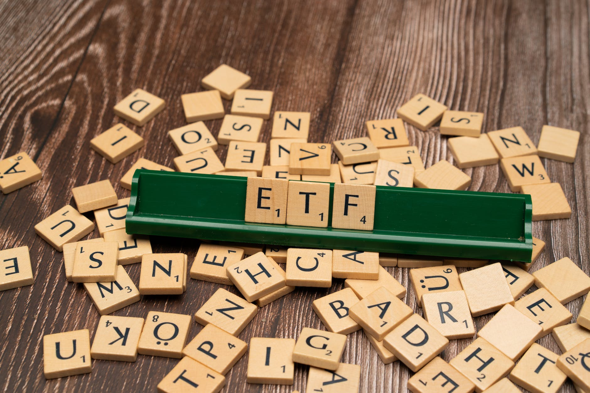 Photo by Markus Winkler on <a href="https://www.pexels.com/photo/the-word-etf-on-a-wooden-board-with-scrabble-tiles-18524062/" rel="nofollow">Pexels.com</a>